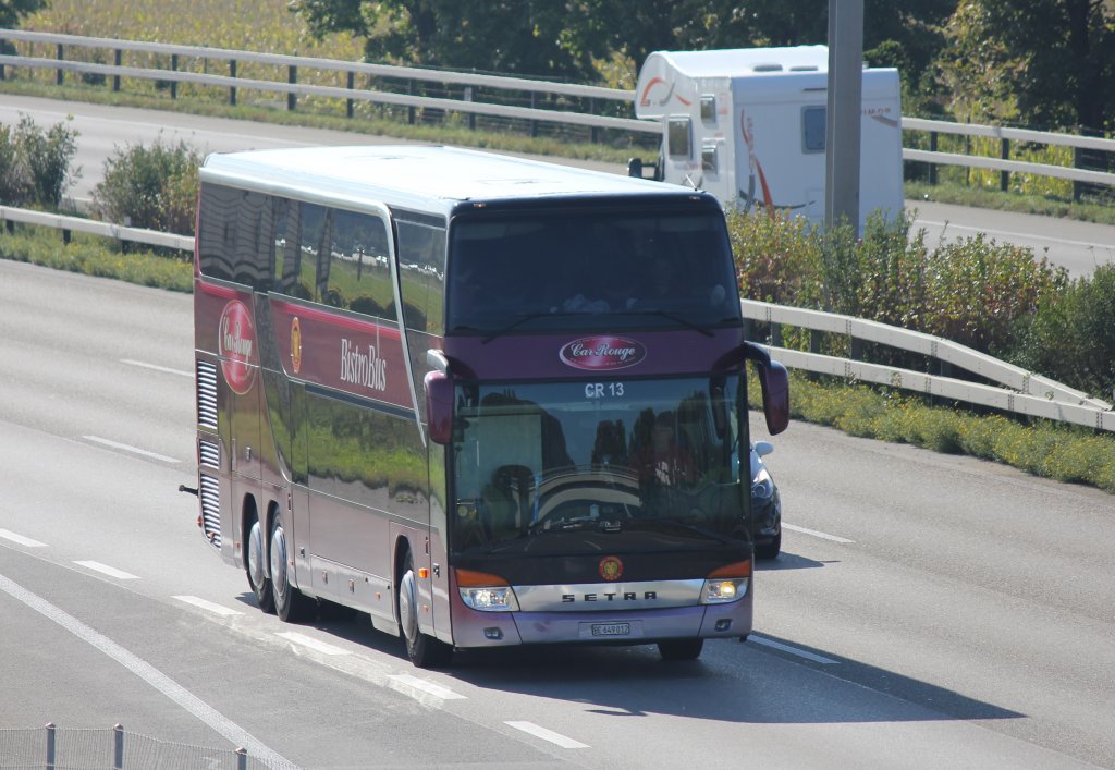 Setra 431 DT de la maison Car Rouge (vhicule transporteur officiel de l'quipe de hockey sur glace de Langnau) photographi le 21.09.2012 prs de Berne