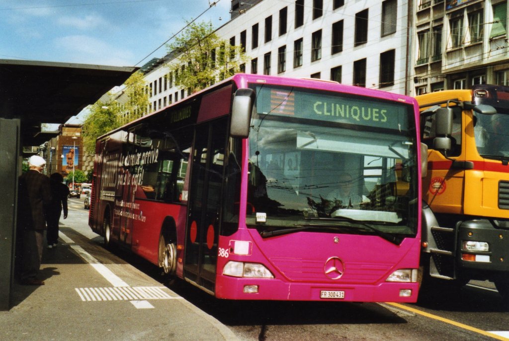 TPF Fribourg Nr 386/FR 300'431 Mercedes Citaro am 19. Mai 2010 Fribourg, Bahnhof (mit Vollwerbung fr  Prolles Centre )