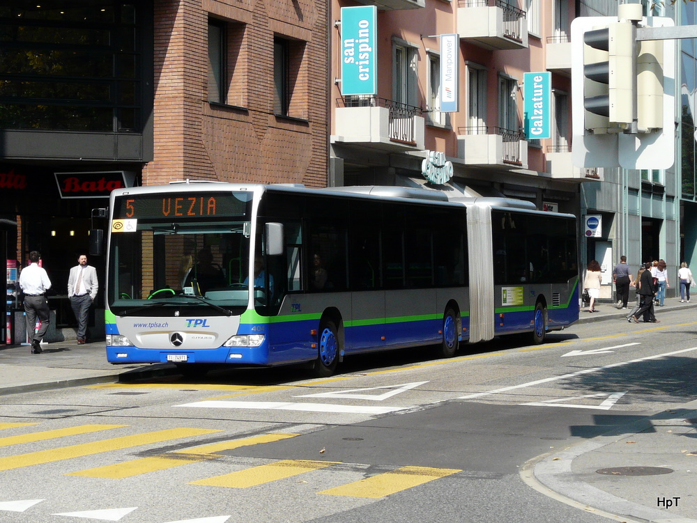 TPL - Mercedes Citaro Nr.404  TI 74971 unterwegs in der Stadt Lugano am 30.09.2011