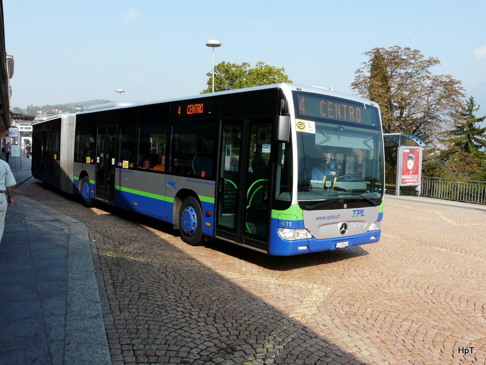 TPL - Mercedes Citaro Nr.411  TI 139643 unterwegs vor dem Bahnhof in Lugano am 30.09.2011