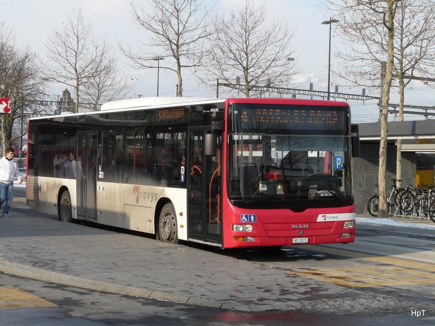 travys - MAN Lion`s City  VD 1071 bei den Bushaltestellen vor dem Bahnhof Yverdon les Bains am 19.12.2009