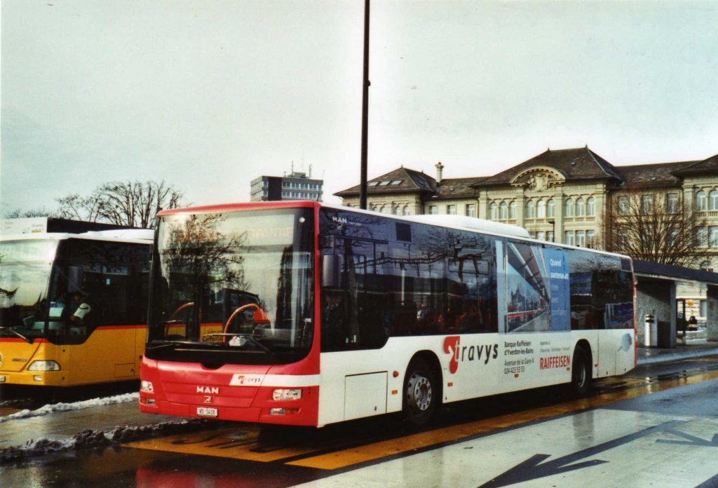 TRAVYS Yverdon VD 1418 MAN am 23. Dezember 2009 Yverdon, Bahnhof