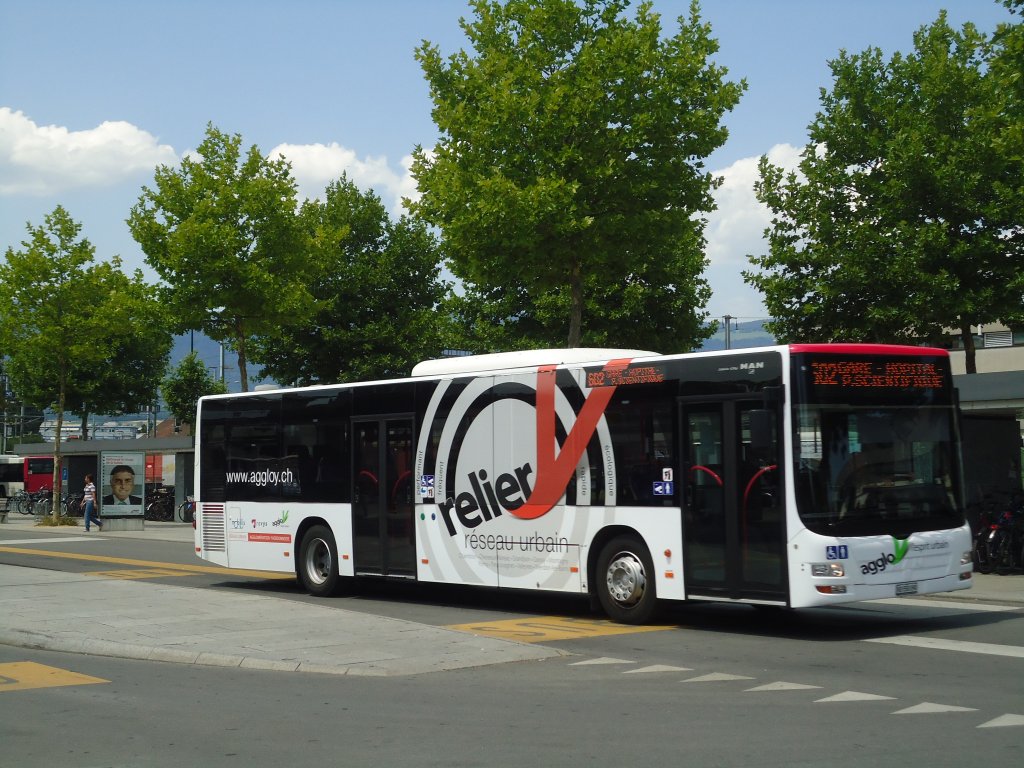 TRAVYS Yverdon - VD 550'090 - MAN am 12. Juli 2011 beim Bahnhof Yverdon (mit Vollwerbung fr  relier )