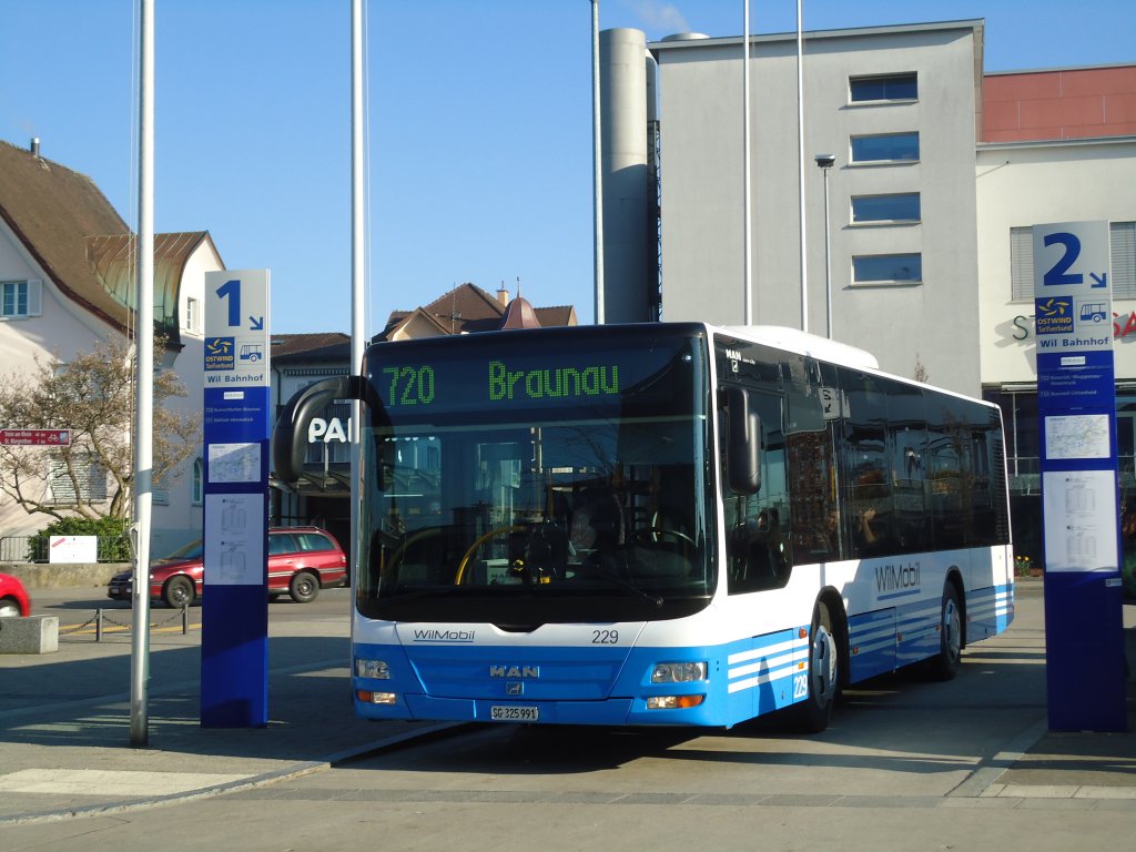 WilMobil, Wil - Nr. 229/SG 325'991 - MAN (ex BSW Sargans Nr. 330) am 23. Mrz 2011 beim Bahnhof Wil