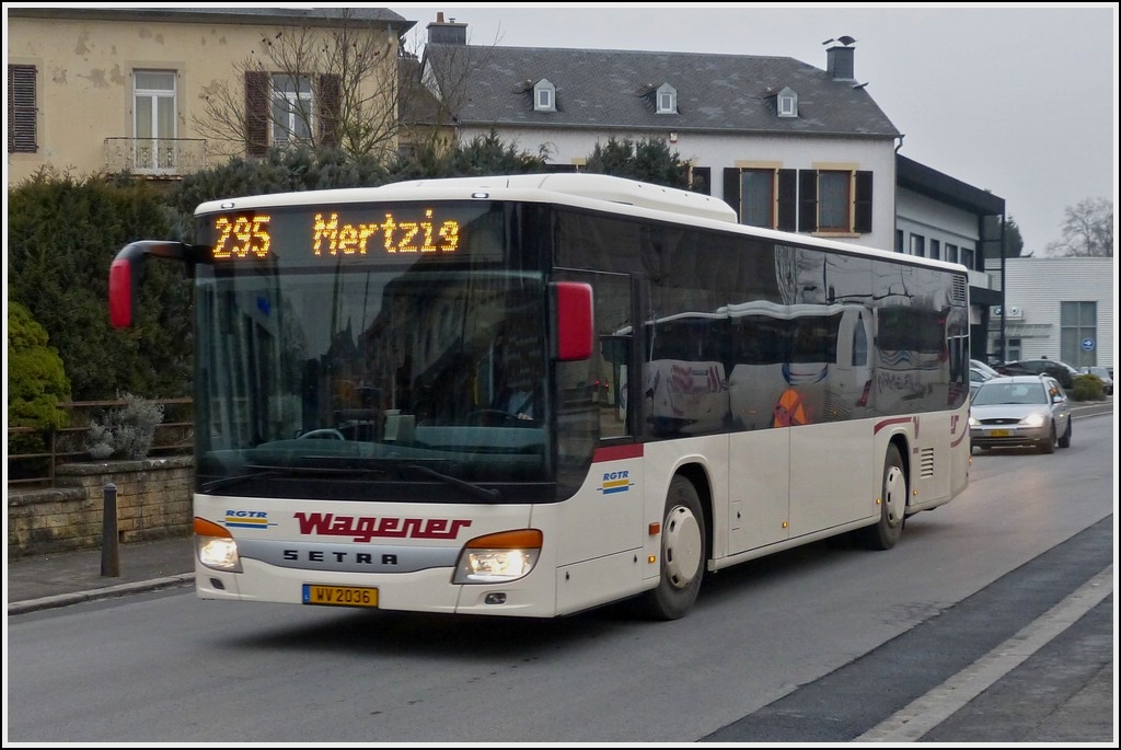 (WV 2036)  Setra S 415 NF des Busunternehmens Wagener aus Mertzig, aufgenommen am Bahnhof in Mersch am 08.04.2013.