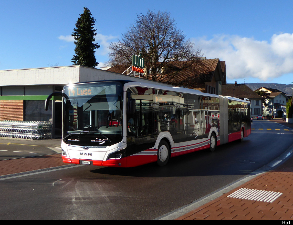 asm Seeland - MAN Lion`s City Hybrid Nr.67 BE 872367 unterwegs auf der Linie 74 in Brügg bei Biel am 13.12.2020