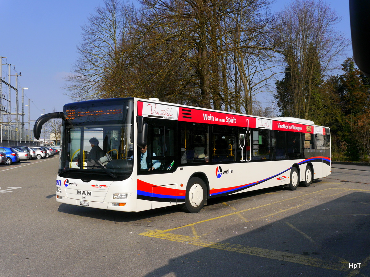 BD/WM - MAN Lion`s City AG 370304 bei den Bushaltestellen beim Bahnhof in Wohlen am 11.03.2016