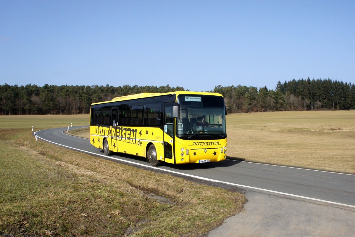 Bus Rheinland-Pfalz: Renault Ares der Reisebüro Dott GmbH, aufgenommen im Februar 2021 in der Nähe von Nachtsheim, einer Ortsgemeinde im Landkreis Mayen-Koblenz.