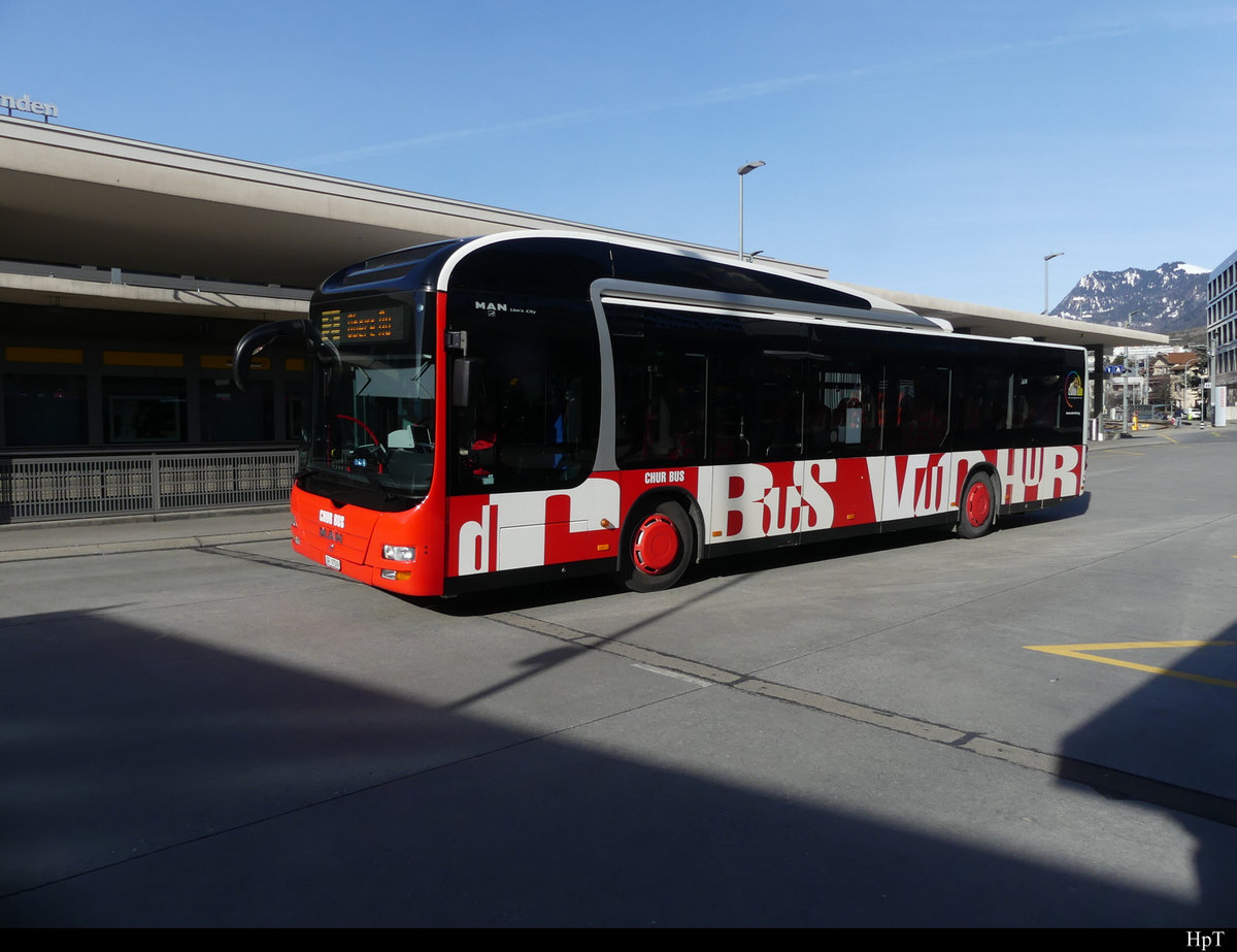 Chur Bus - MAN Lion`s City GR 97509 unterwegs bei den Bushaltestellen vor dem Bahnhof in Chur am 19.02.2021