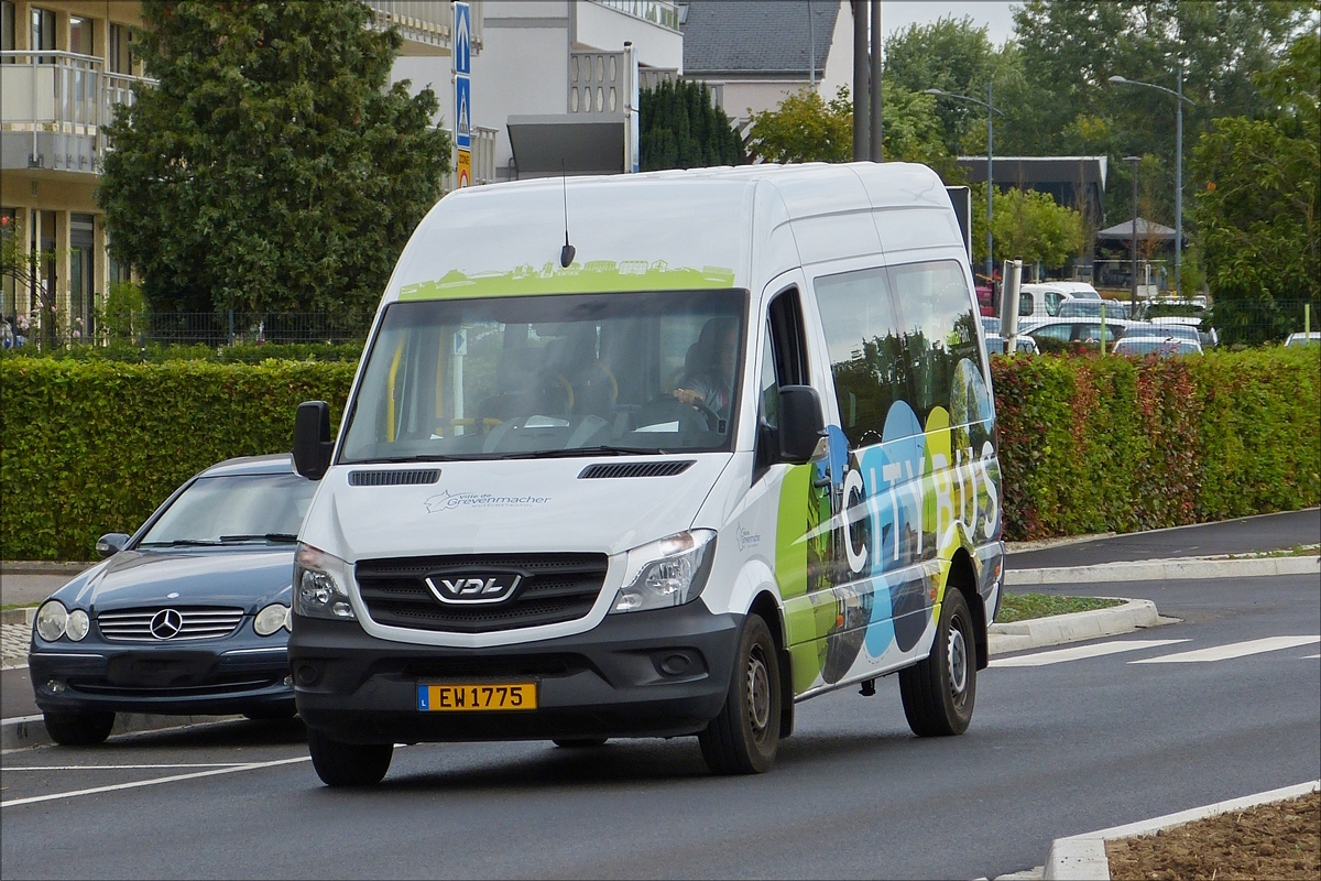 EW 1775,  VDL Minibus als Citybus in den Strassen von Grevenmacher unterwegs.                Der Minibus basiert auf dem Mercedes Benz Sprinter, der Umbau auf Elektronischen Antrieb wurde von VDL realisiert. 24.08.2018(Hans)