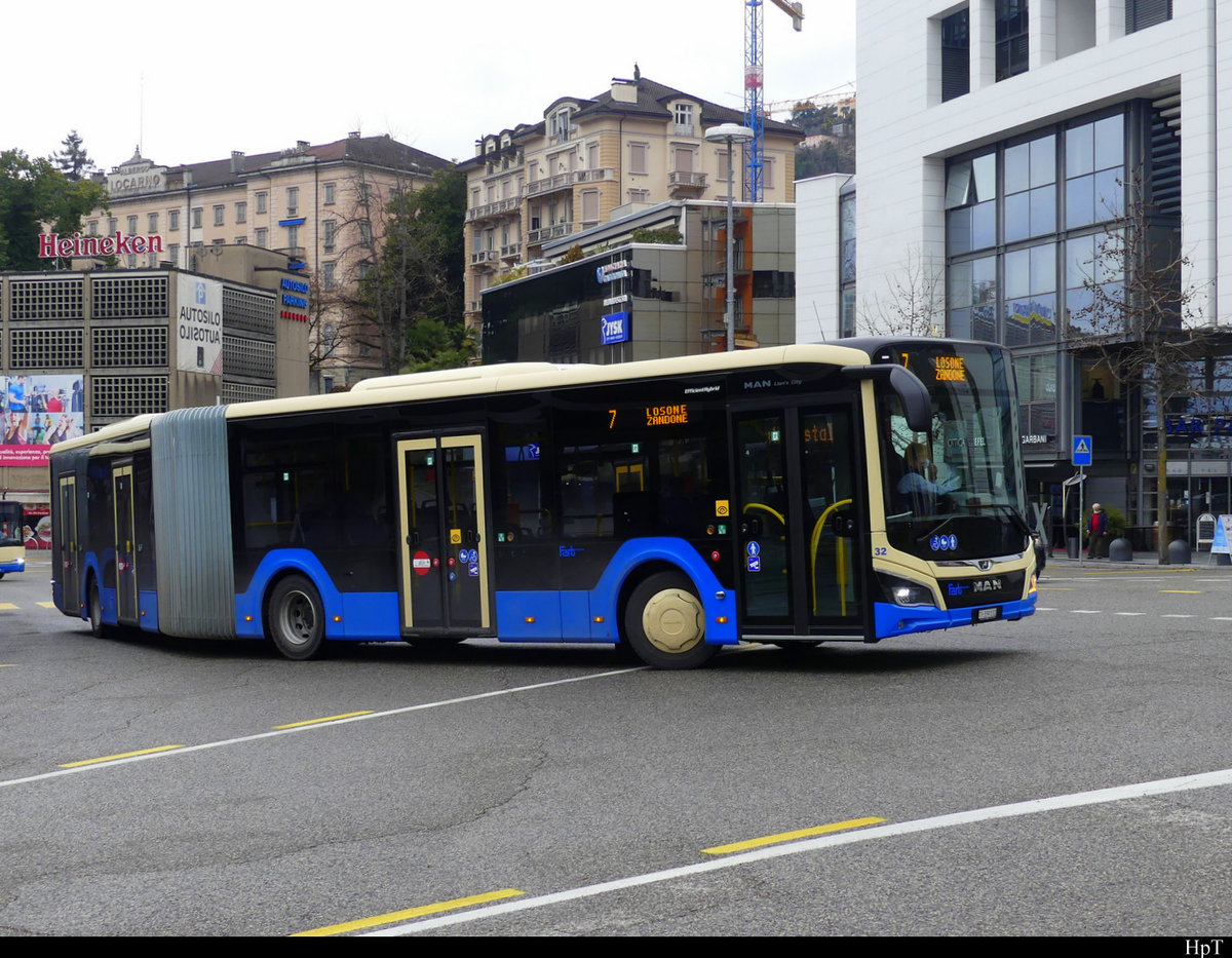 FART - MAN Lion`s City Nr.32  TI 339132 in Locarno vor dem Bahnhof bei den Bushaltestellen am 12.02.2021