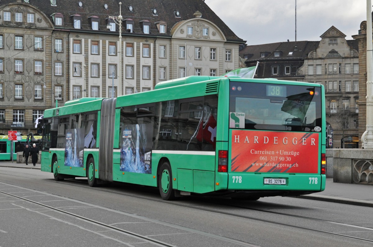 MAN Bus 778 auf der Linie 38 überquert die Mittlere Rheinbrücke. Die Aufnahme stammt vom 04.02.2015.