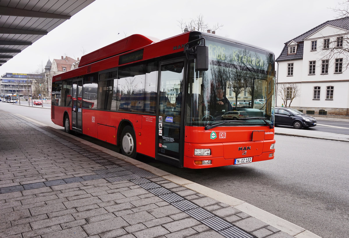 MAN-Bus von DB Frankenbus, unterwegs auf der Kfl. 8306, als Kurs 7403 021 (Coburg Bahnhof/ZOB B1 - Kronach Busbahnhof), am 21.3.2016 an der Haltestelle Coburg Bahnhof/ZOB B1.