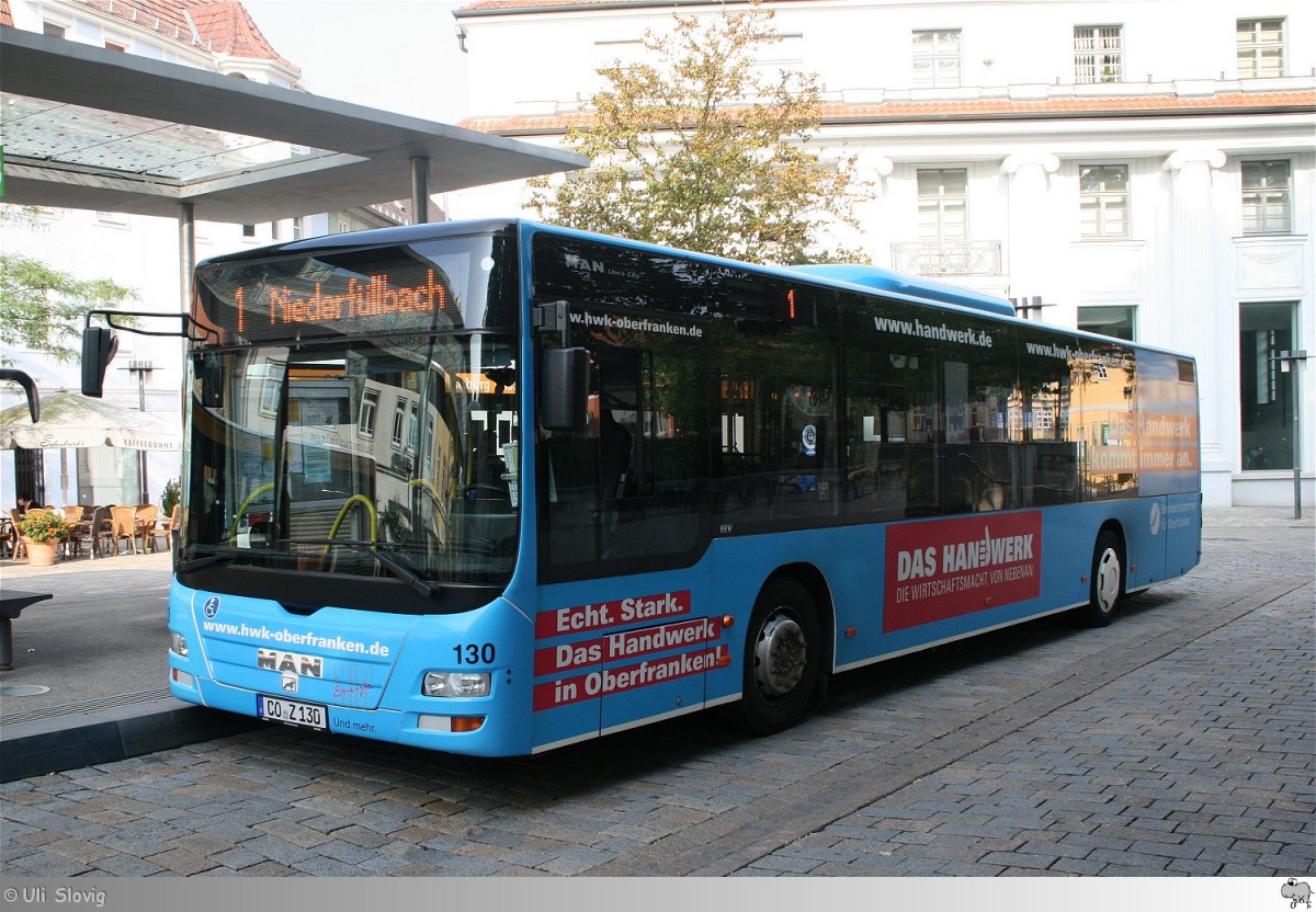 MAN Lion's City  Städtische Werke Überlandwerke Coburg (SÜC) Bus und Aquaria GmbH  mit Vollwerbung für das Handwerk. Aufgenommen am 2. August 2014.