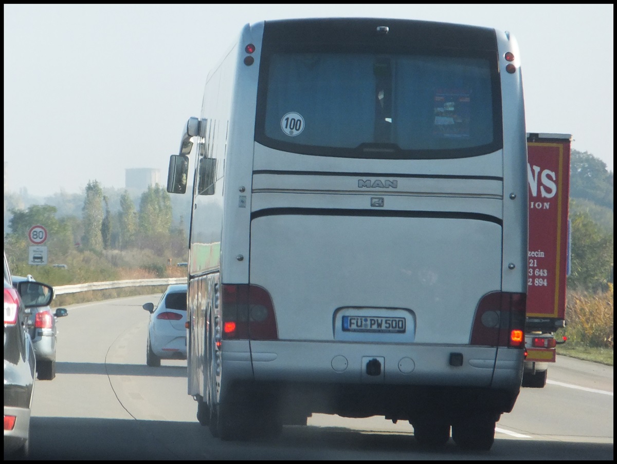 MAN Lion's Coach von Express-Tour aus Deutschland auf einer Autobahn am 19.10.2013