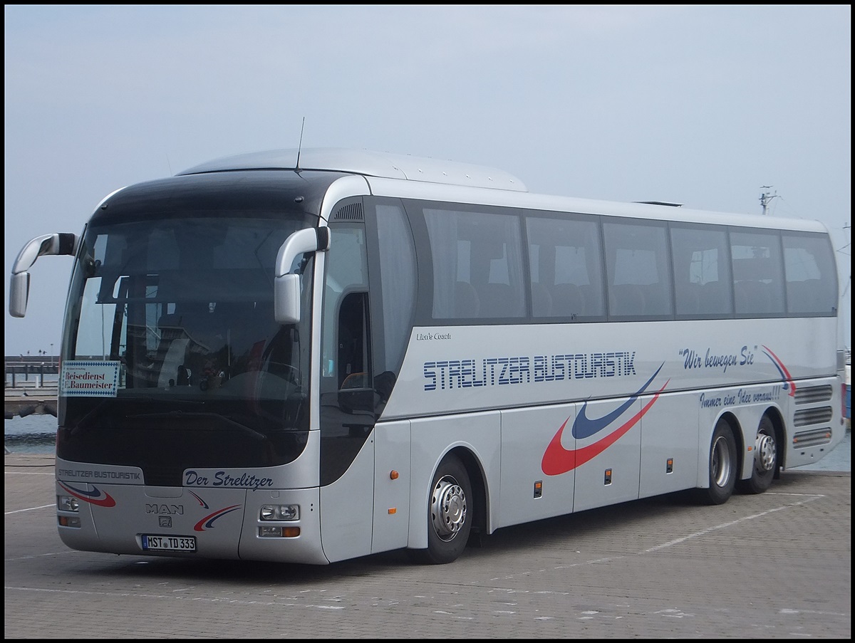 MAN Lion's Coach von Strelitzer Bustouristik aus Deutschland im Stadthafen Sassnitz am 30.08.2013