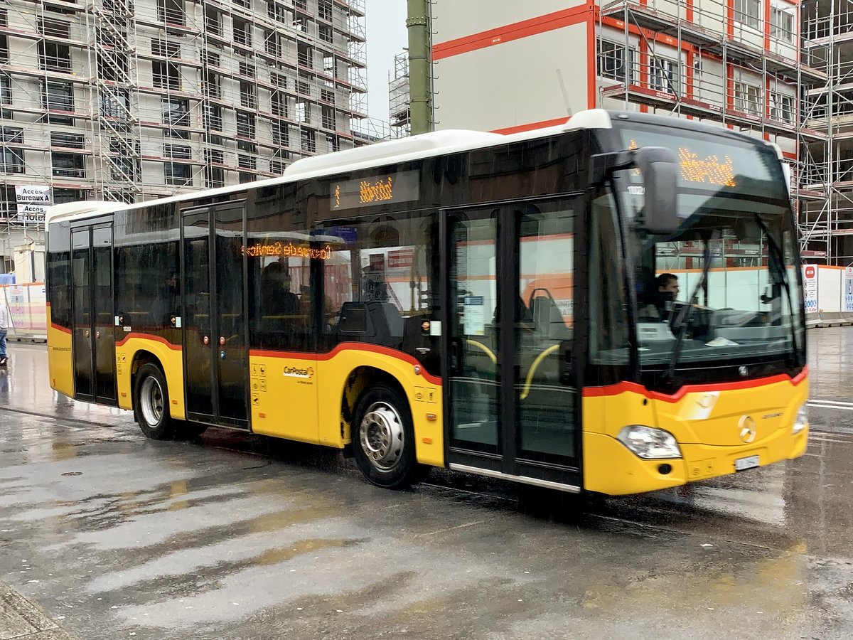 MB C2 K '10260' von PostAuto am 16.3.21 bei der Ankunft in Delemont.