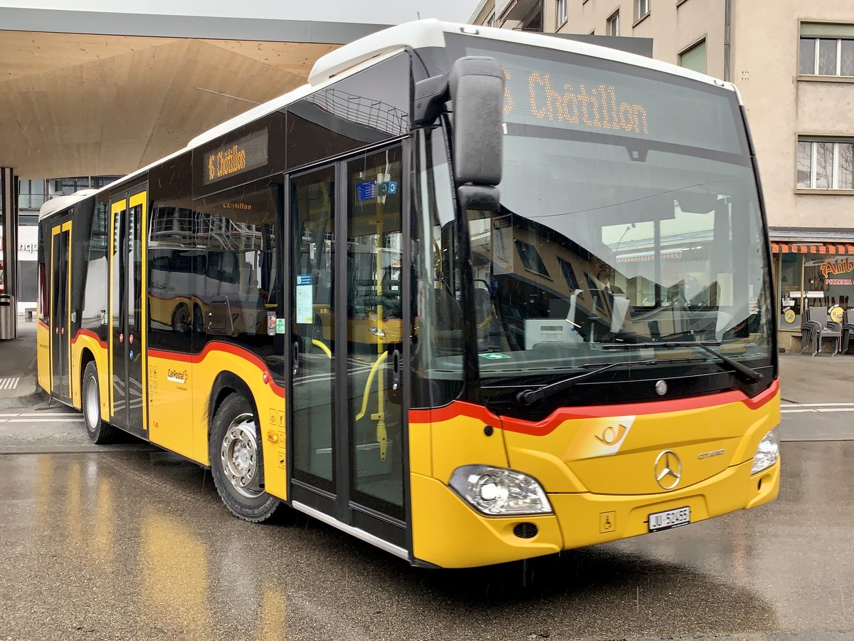 MB C2 K hybrid '11331'  JU 52455  am 16.3.21 bei der Abfahrt in Delemont.