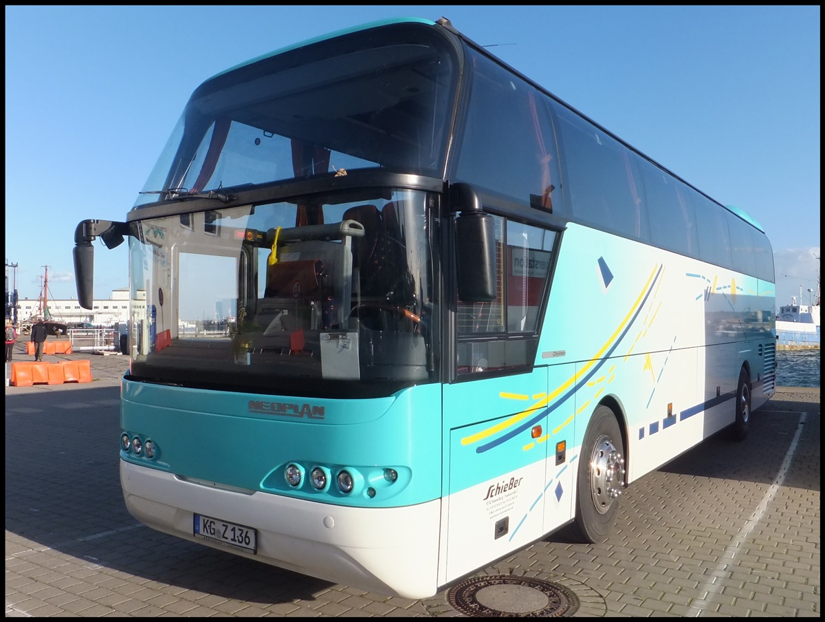 Neoplan Cityliner von Schieer (ex Plm Reisen) aus Deutschland im Stadthafen Sassnitz am 24.10.2013