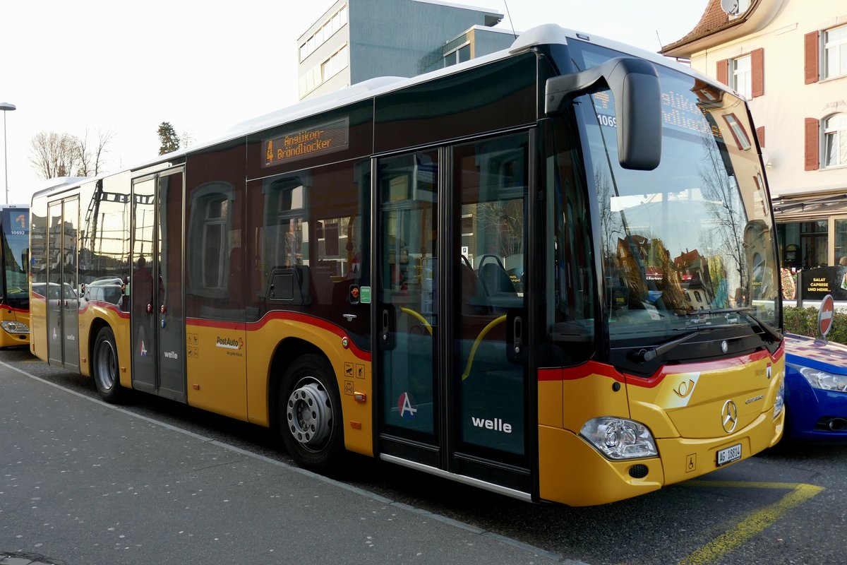 Ortsbus Wohlen PostAuto MB C2 K '10694' 'AG 18814'  Wohlen  vom PU Geissman Bus AG, Hägglingen am 21.3.19 beim Bhf Wohlen AG.