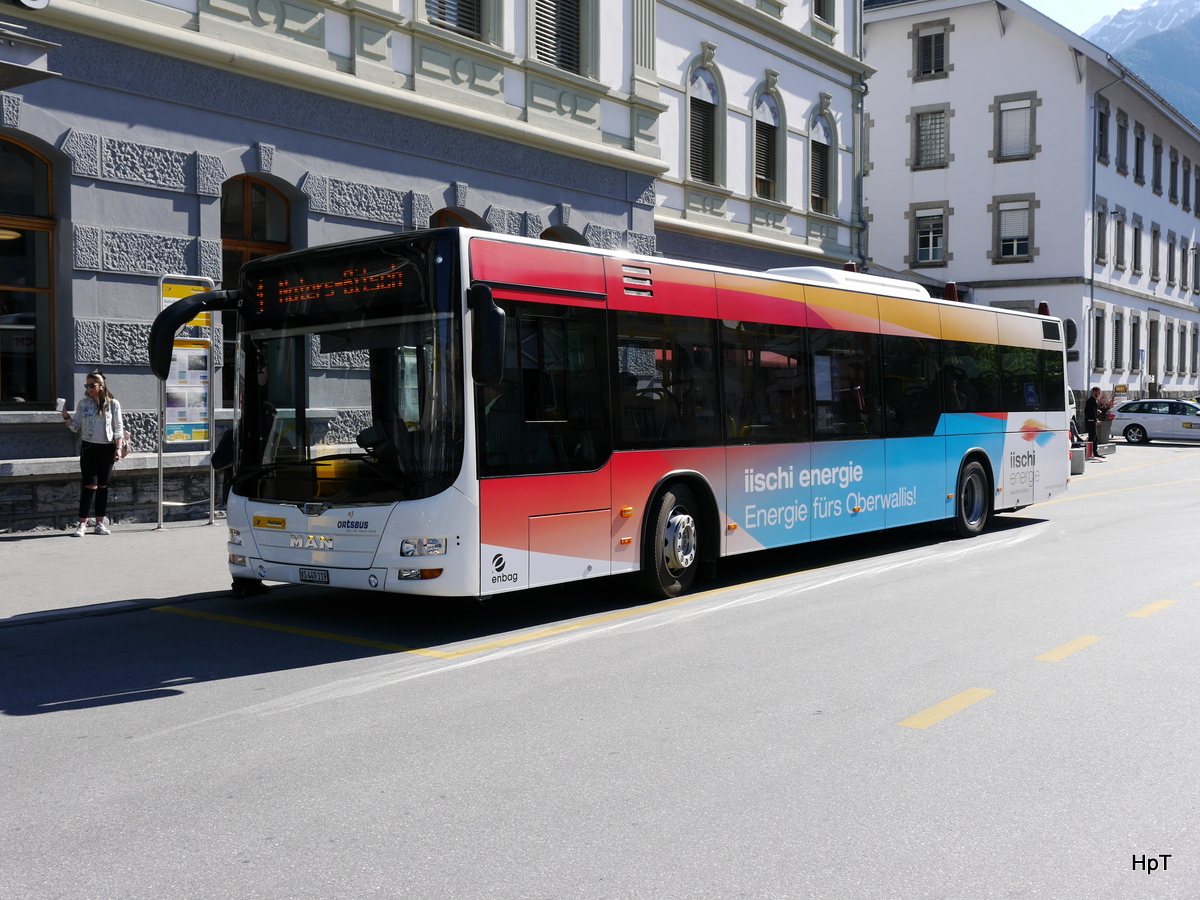 Postauto / Ortsbus Brig - MAN Lion`s City VS 449119 vor dem Bahnhof in Brig am 18.05.2018