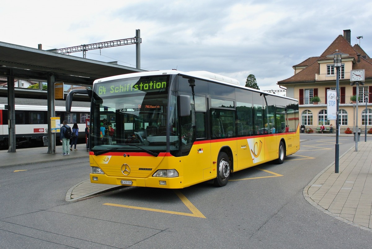 Postauto Citaro I auf der Linie 64 beim Bahnhof Spiez, 20.08.2014.