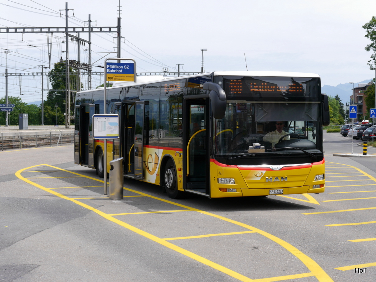 Postauto - MAN Lion`s City  SZ  110223 bei den Haltestellen beim Bahnhof Pfäffikon/SZ am 26.07.2015