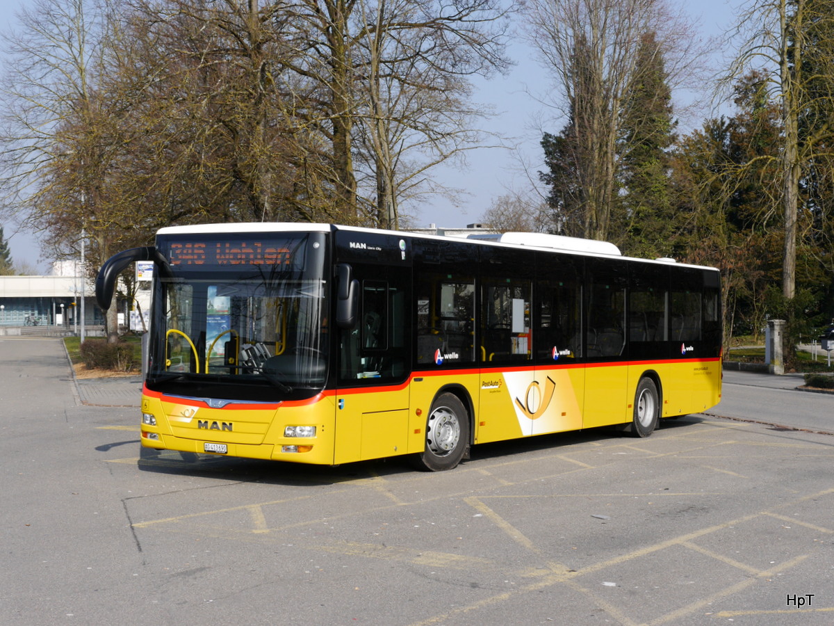 Postauto - MAN Lion`s City AG 413690 unterwegs beim Bahnhof Wohlen am 11.03.2016