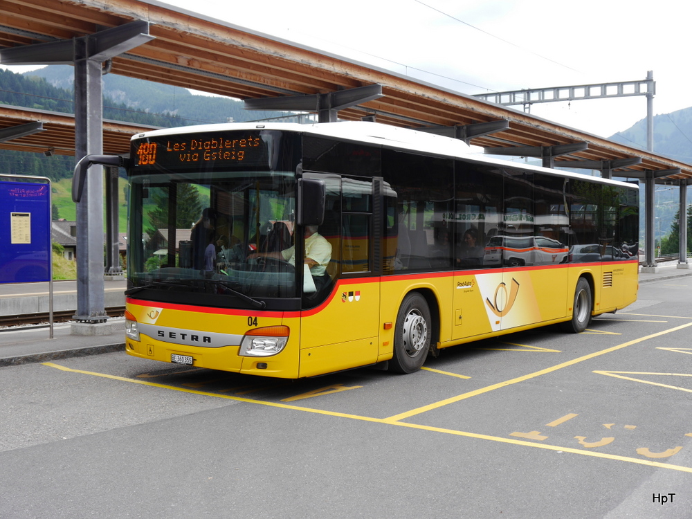 Postauto - Setra S 415 NF  BE 360355 in Gstaad bei den Bushaltestellen auf dem Bahnhofsplatz am 27.07.2014