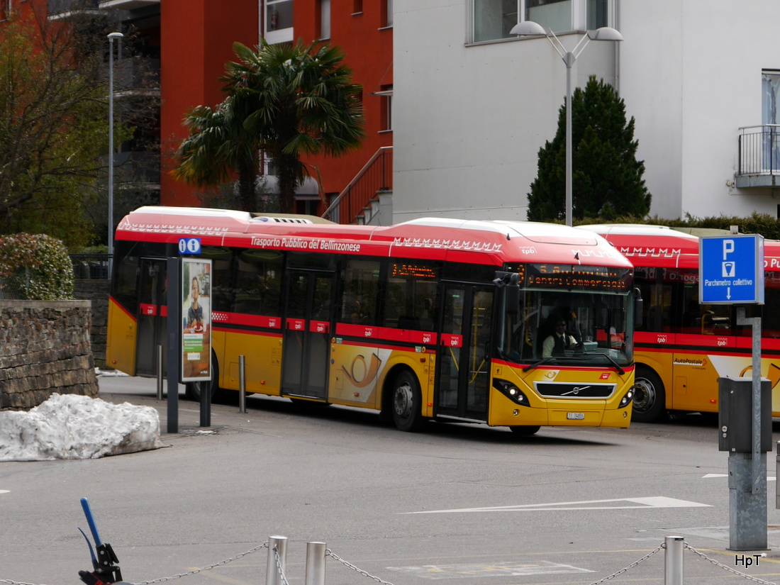 Postauto - Volvo 7900 Hybrid  TI 74055 unterwegs in Giubiasco am 27.02.2015
