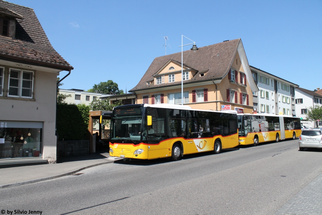 Postauto/PU ABSN Nr. 312 (Mercedes Citaro C2 O530K) und Regie ZH-Unterland Nr. 285 (Mercedes Citaro Facelift O530G) am 30.7.2016 in Bülach, Sonnenhof