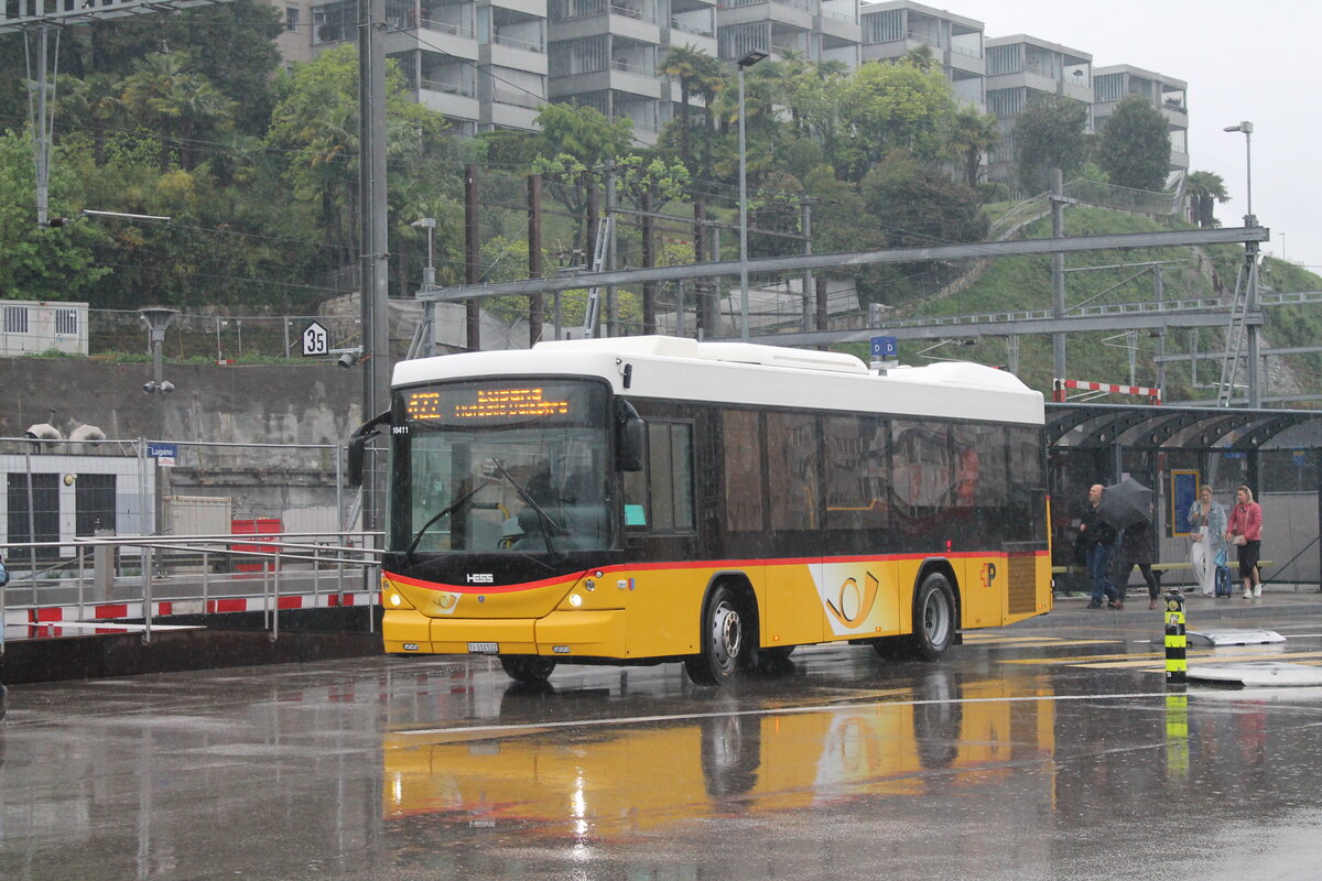 Postauto/PU ATM TI 310 512/PAG-ID: 10411 (Scania/Hess K320UB ''Bergbus'') am 13.4.2026 beim Bhf. Lugano