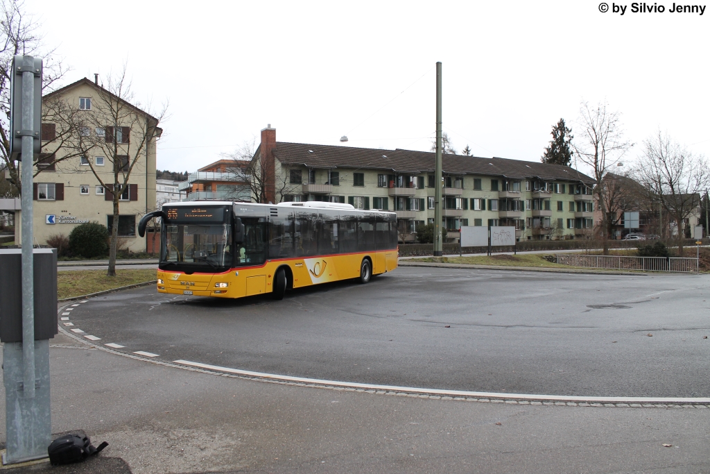 Postauto/PU Motrag Nr. 288 (MAN A21 Lion's City) am 9.2.2014 beim Bahnhof Oberwinterthur