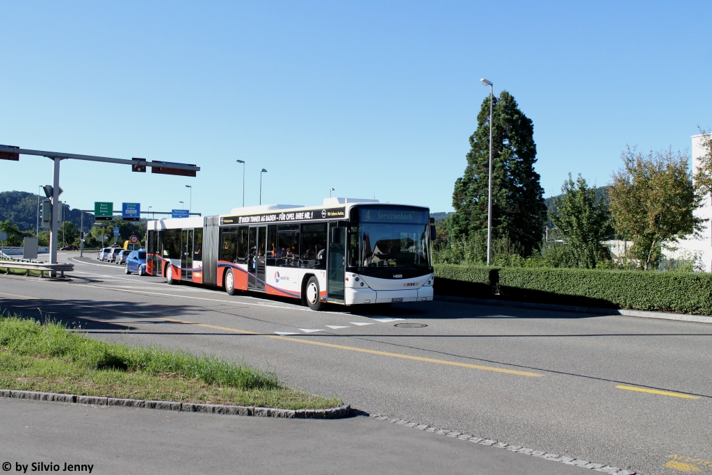 RVBW Nr. 145 ''Baden'' (Scania/Hess N310UA) bei schwierigen Lichtverhältnissen am 23.8.2016 in Neuenhof, Kreuzstein