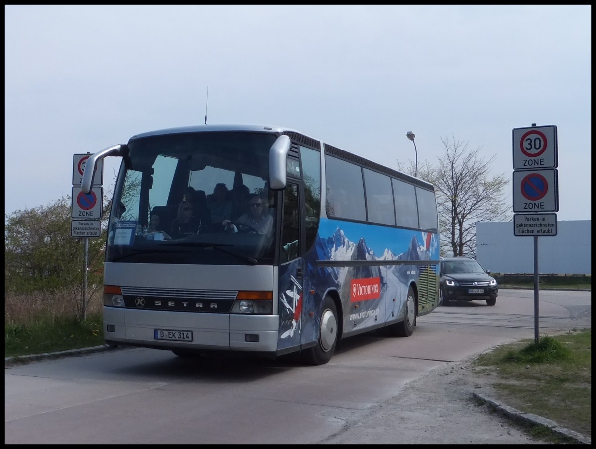 Setra 312 HD von Holiday Reisen aus Deutschland (ex Ruffiner/Schweiz) im Stadthafen Sassnitz am 20.04.2014