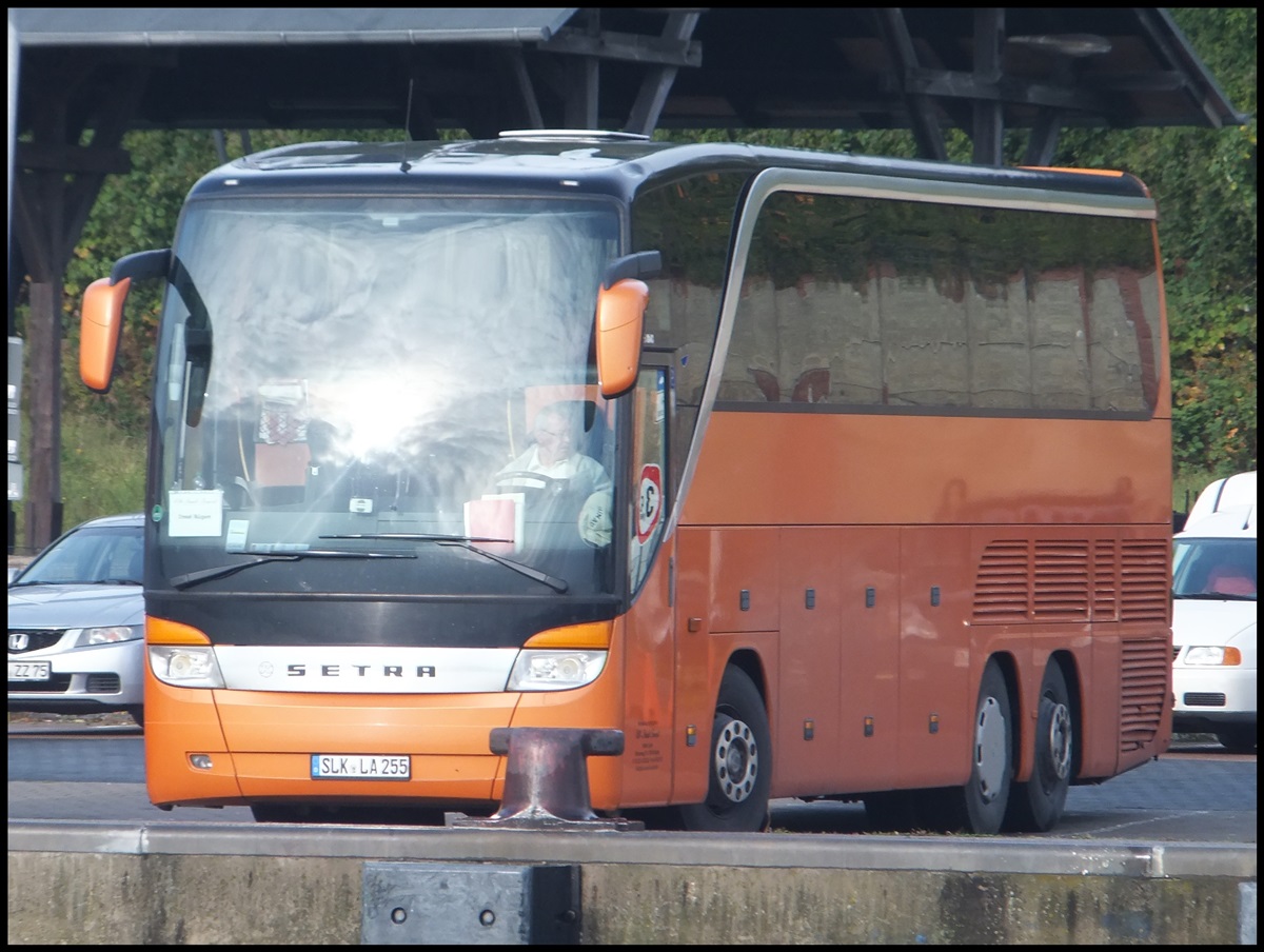 Setra 415 HDH von Elb-Saale Tourist aus Deutschland im Stadthafen Sassnitz am 20.10.2013