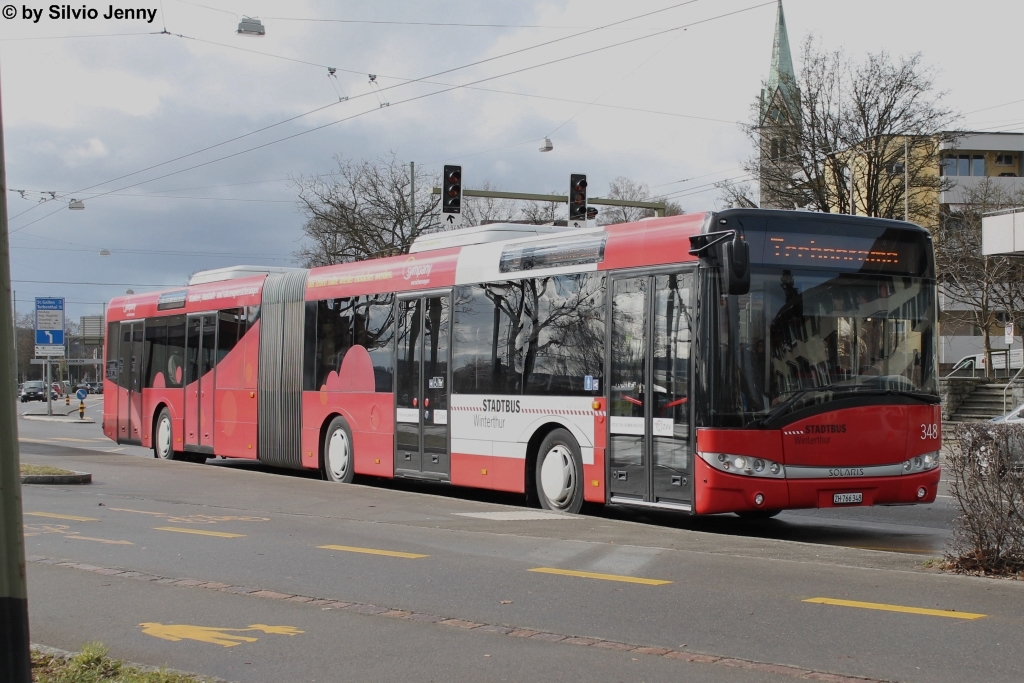 Stadtbus Winterthur Nr. 348 ''sympany'' (Solaris Urbino 18) am 9.2.2014 beim Bahnhof Oberwinterthur