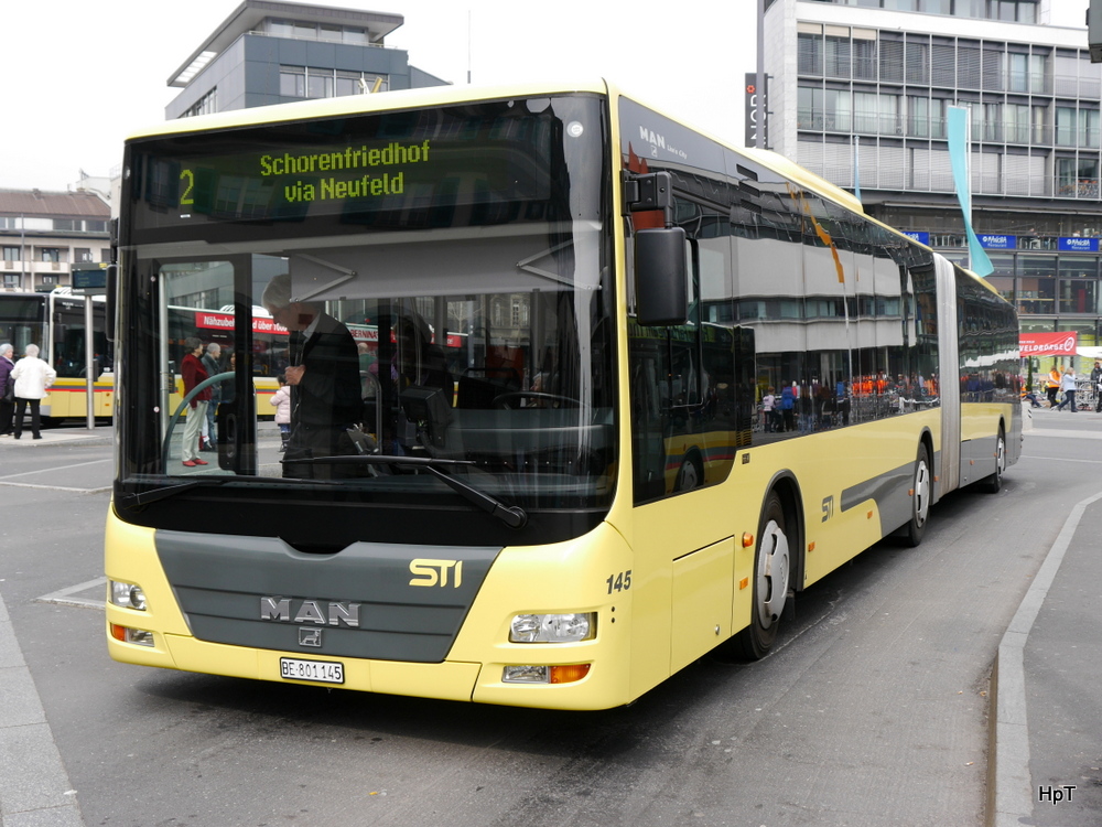 STI - MAN Lion`s City Nr.145 BE 801145 bei den Bushaltestellen vor dem Bahnhof Thun am 15.03.2014