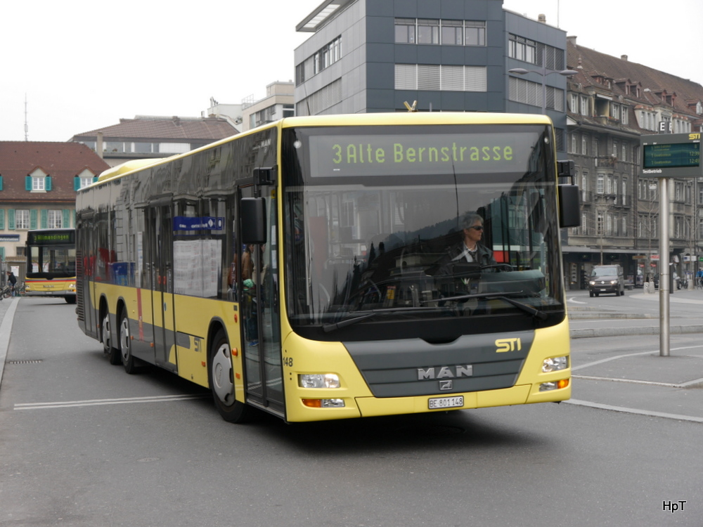 STI - MAN Lion`s City Nr.148  BE 801148 bei den Bushaltestellen vor dem Bahnhof Thun am 15.03.2014