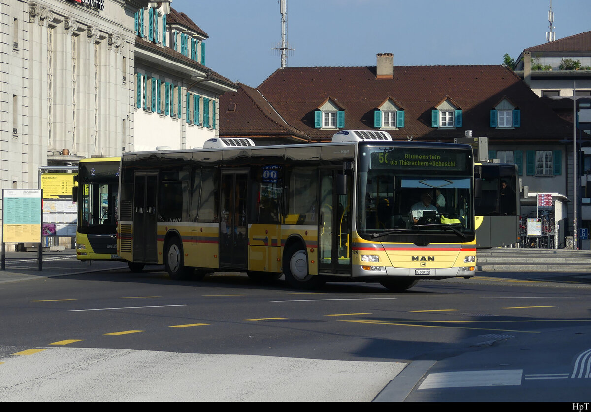 STI - MAN Lion`s City  Nr.129 unterwegs vor dem SBB Bahnhof Thun am 14.05.2022