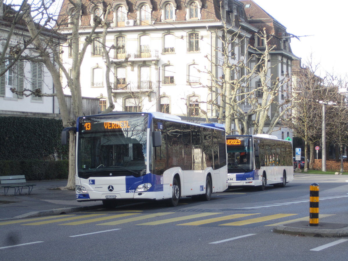 tl Nr. 327 (Mercedes Citaro C2 O530K) + Nr. 410 (MAN A21 Lion's City) am 23.2.2020 in Lausanne, Montbenon