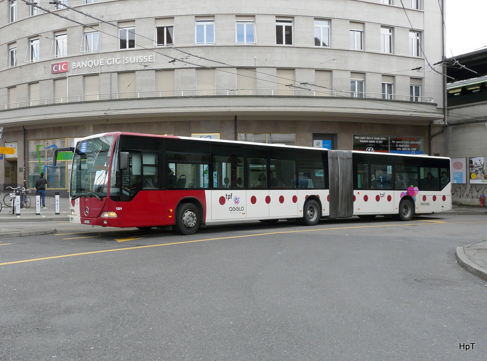 tpf - Mercedes Citaro Nr.584 FR 300392 unterwegs beim Bahnhof von Fribourg am 01.03.2014