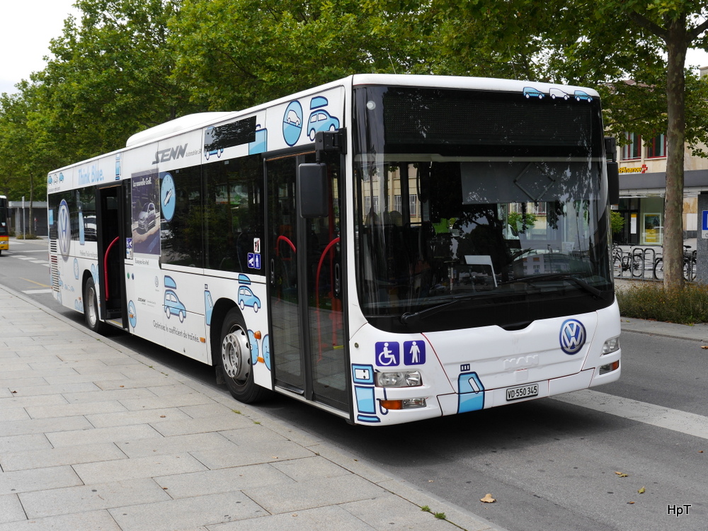 Travys - MAN Lion`s City  VD 550345 bei den Bushaltestellen vor dem Bahnhof von Yverdon les Bains am 20.07.2014