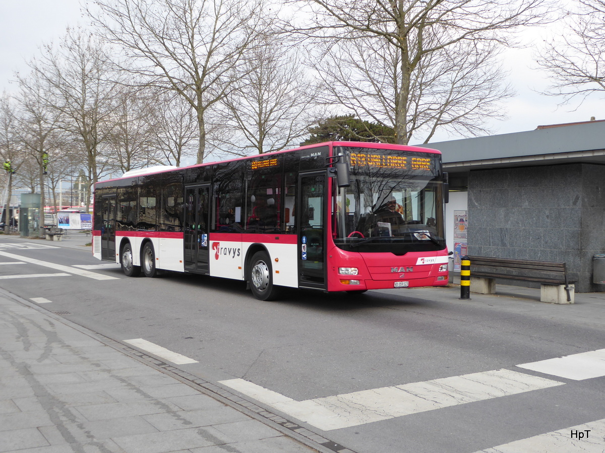 travys - MAN Lion`s City  VD  259123 unterwegs vor dem Bahnhof in Yverdon les Bains am 18.02.2016