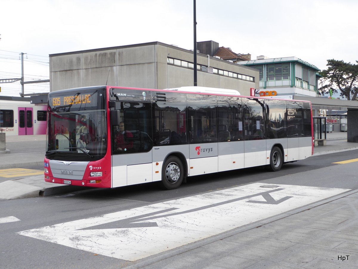 travys - MAN Lion`s City  VD  587546 vor dem Bahnhof in Yverdon les Bains am 18.02.2016