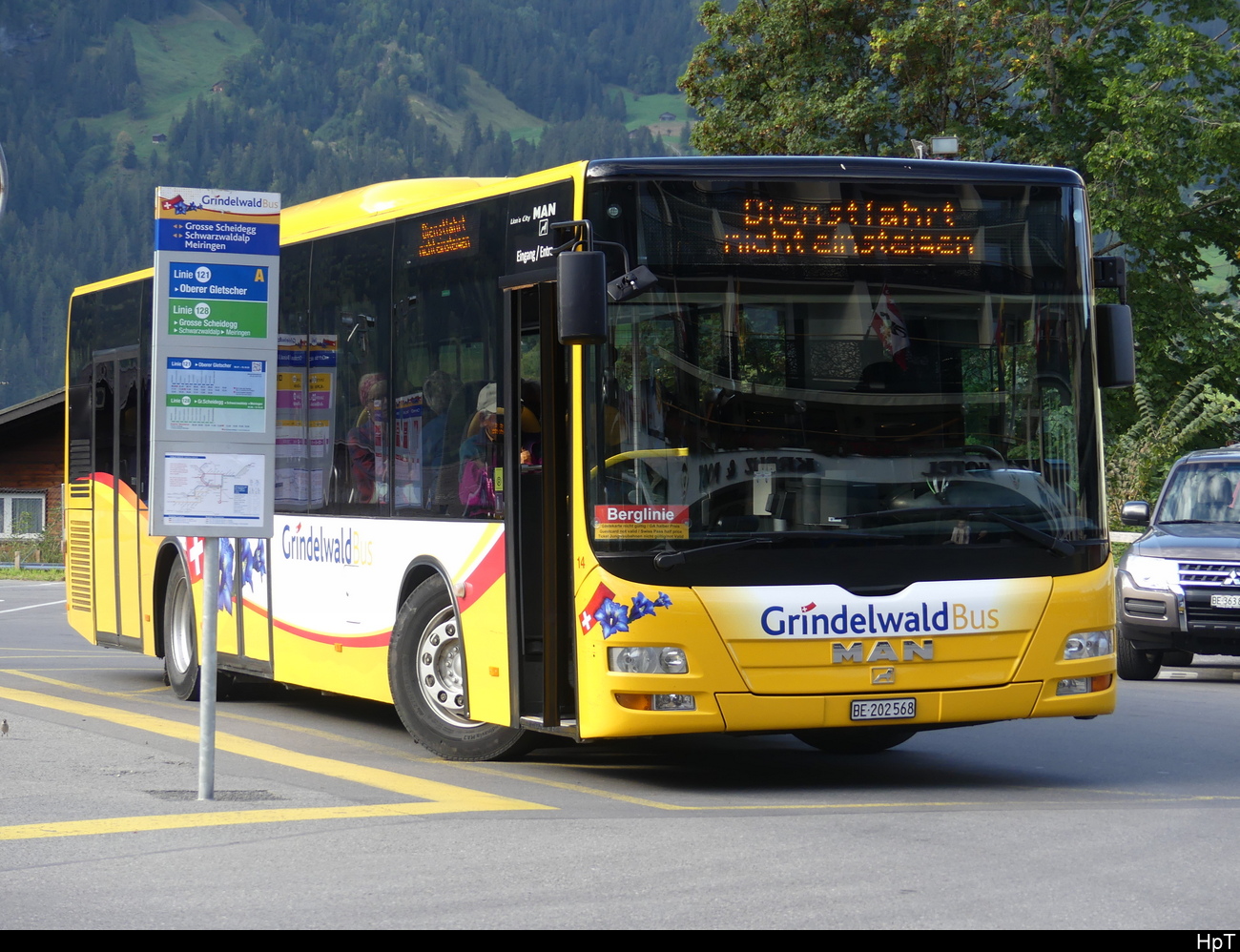 Grindelwald Bus - MAN Lion`s City  BE 202568 bei Busbahnhof neben dem WAB/ BOB Bahnhof in Grindelwald am 28.09.2023