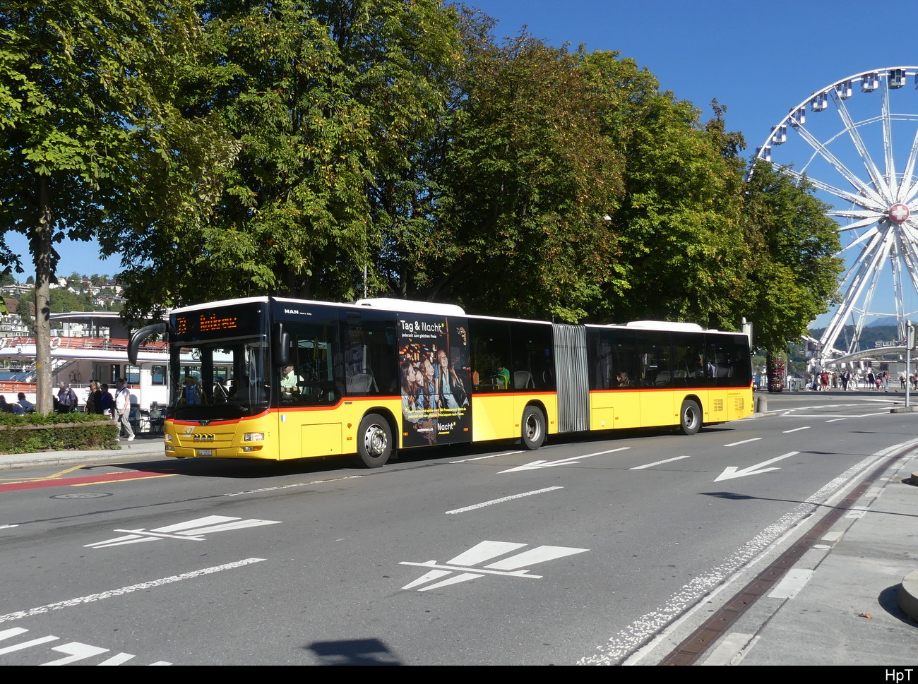 Postauto - MAN Lion`s City  LU  15527 unterwegs beim Bahnhof Luzern am 25.09.2023
