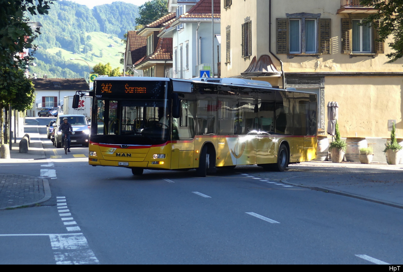 Postauto - MAN Lion`s City OW 10023 in den Strassen von Alpnach am 20.09.2023