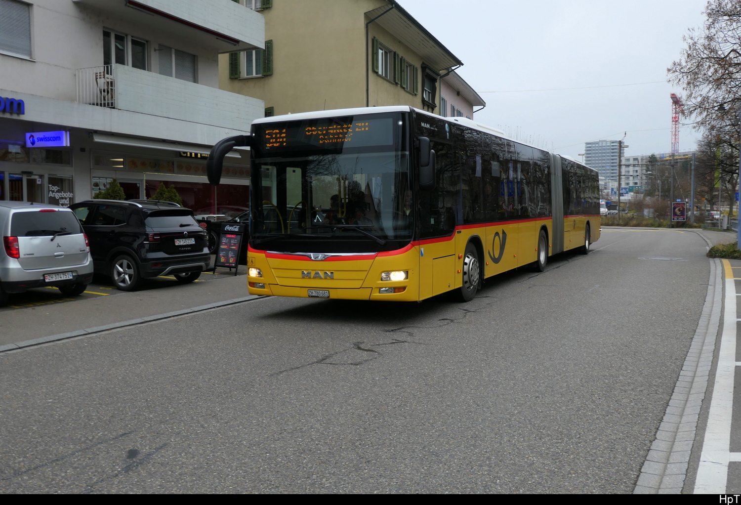 Postauto - MAN Lion`s City ZH 780681 unterwegs in Bülach am 13.12.2025