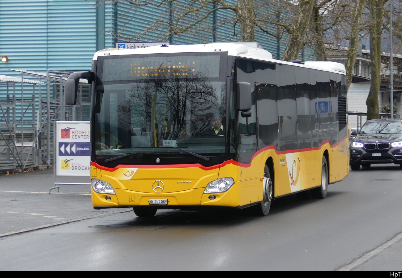 Postauto - Mercedes Citaro  BE  654089 unterwegs in Interlaken am 04.02.2023